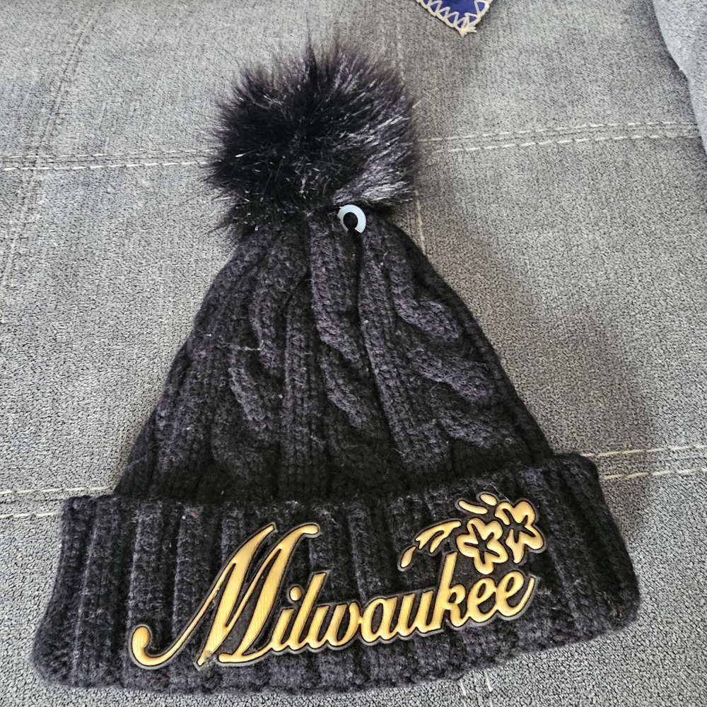 Black Pom Pom Beanie with Gold "Milwaukee" Patch